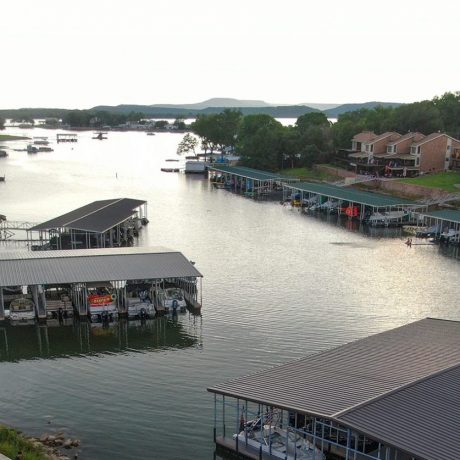 aerial view of lake with boat slips